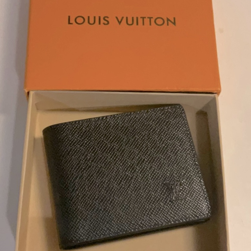Louis Vuitton. Black single logo multiple wallet.